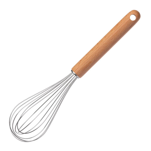 白で隔離された木製のハンドル付きウィスク - equipment egg beater household equipment kitchen utensil ストックフォトと画像