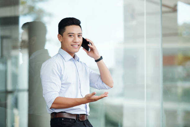 istock Confident businessman calling on phone 1167555011