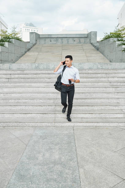 istock Young entrepreneur walking outdoors 1167555775
