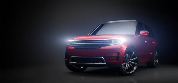 Modern red SUV car in garage with lights turned on