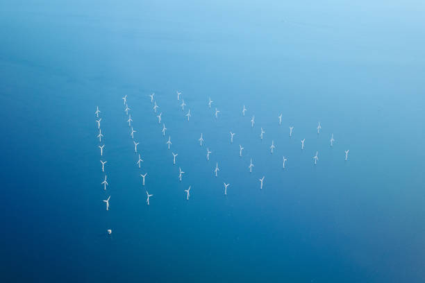 Top view of wind farms in the sea stock photo
