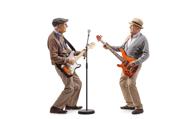 two elderly men having a jam session with electric guitars - jam up imagens e fotografias de stock