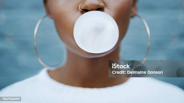Talk Is Cheap Stock Photo - Download Image Now - Bubble Gum, Women, One Woman Only