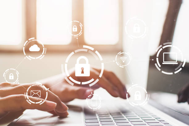 istock Businessman working on laptop. Protection network security computer and safe your data concept. Digital crime by an anonymous hacker 1167560531