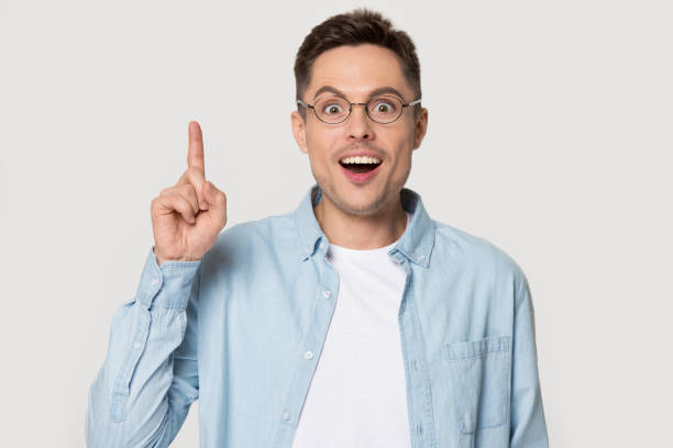 istock Amazed guy makes big eyes suddenly invented a great idea 1167560998