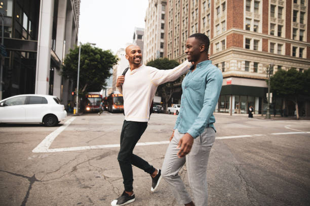 istock Handsome couple walking in downtown 1167564760