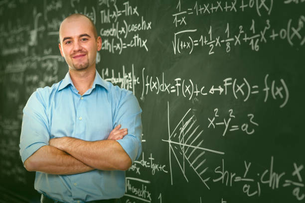 istock Portrait Of Teacher Standing In Classroom 1167565353