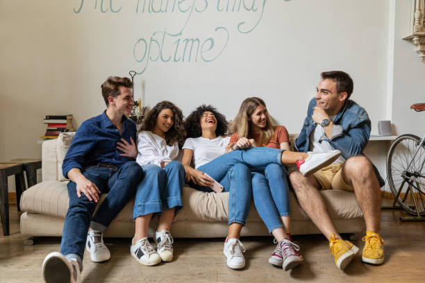 istock Happy group of friends at home 1167578154