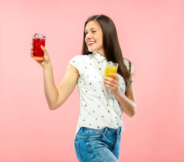 istock Smilling Young Brunette Sharing Other Glass of Ice Tea 1167579340