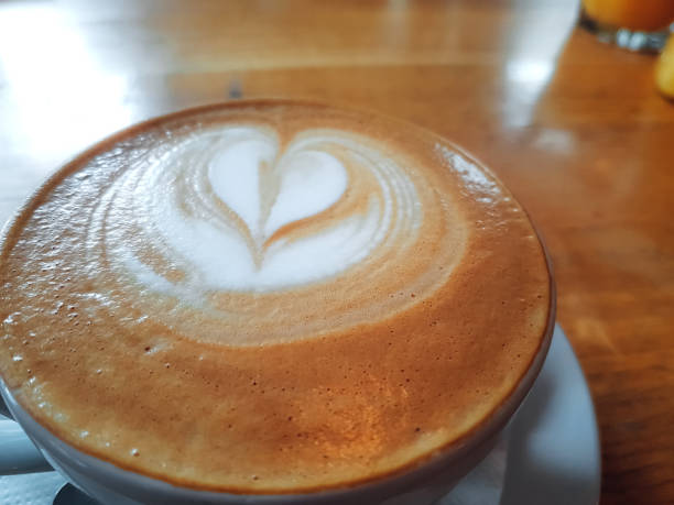 istock Coffee cup with heart latte art 1167579350