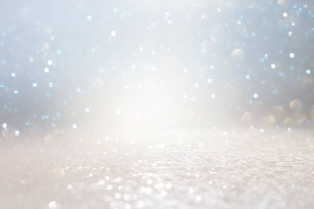 istock blackground of abstract glitter lights. silver and gold. de-focused 1167579620