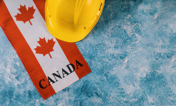 istock Canadian red and white flag against dark rustic background for Canada Day celebration and national holidays 1167579641