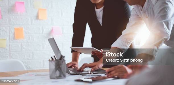 Teamwork Brainstorming Meeting And New Startup Project In Workplace Quality Successful Work Concept Vintage Effect Stock Photo - Download Image Now