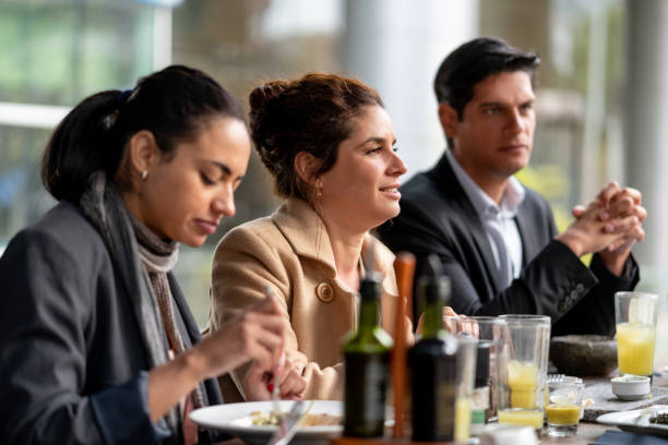 istock Business people enjoying their lunch at a restaurant 1167579908