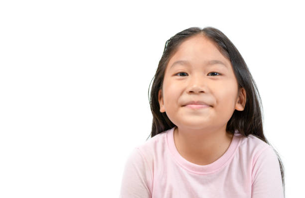 istock Cute asian girl smile isolated on white 1167581410