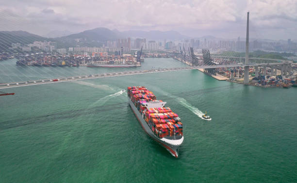 istock Container cargo ship on Terminal commercial Port,Business logistic and transportation industry in Hong kong,Water transport International 1167582282