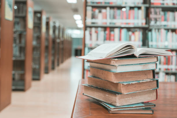 istock Book stack in the library room with copy space for business and education background.back to school concept 1167582720