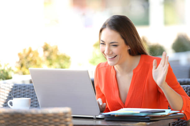 istock Happy self employed having a video call with a laptop 1167582991
