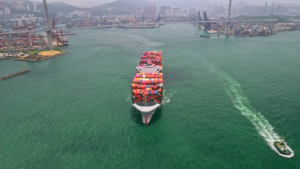 istock Container cargo ship on Terminal commercial Port,Business logistic and transportation industry in Hong kong,Water transport International 1167583068