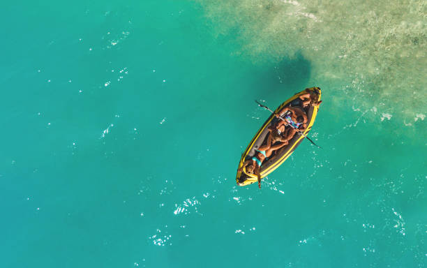 istock Happy Family In A Boat 1167585426