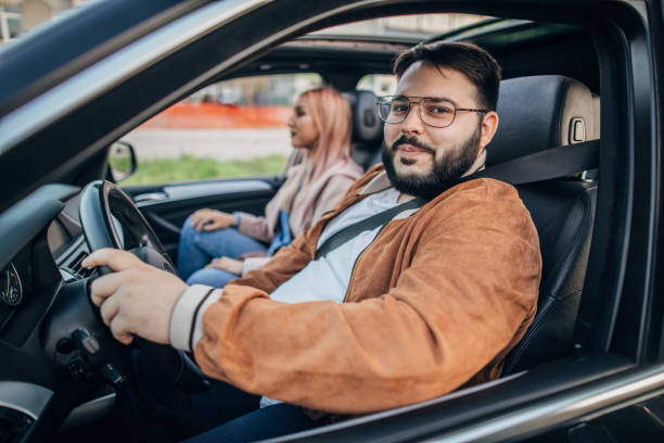 istock Friends sitting in the car 1167585642
