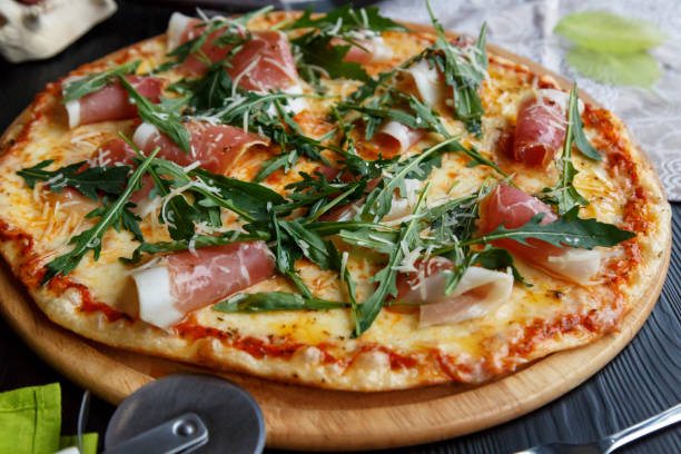 istock Pizza with bacon, cheese and greens 1167588254