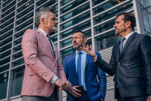 istock Three businessmen standing outdoors 1167588732