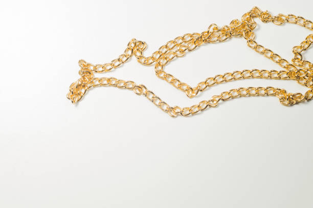 istock Golden chain isolated on white 1167594345