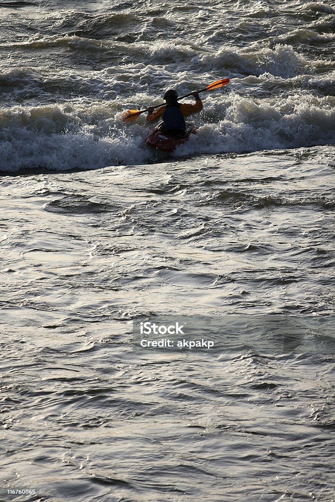 Kayaker with sun-lit paddle  Missoula Stock Photo
