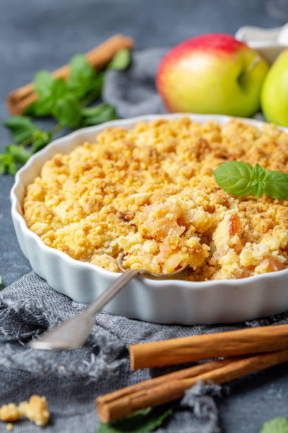 istock Apple crumble and a dessert spoon closeup. 1167605224