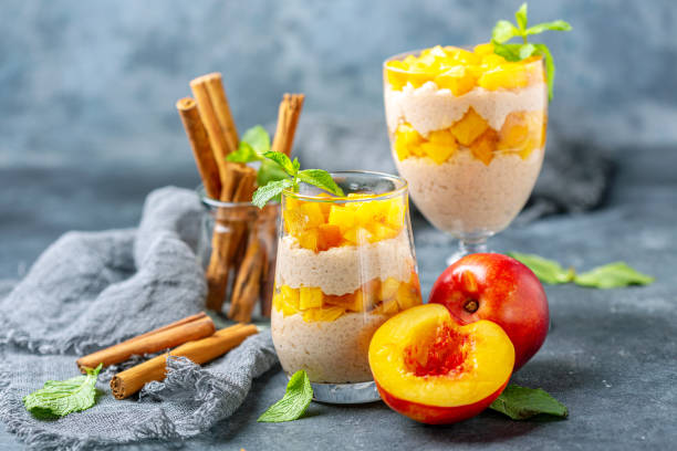 istock Rice pudding with pieces of nectarine in glasses. 1167606584