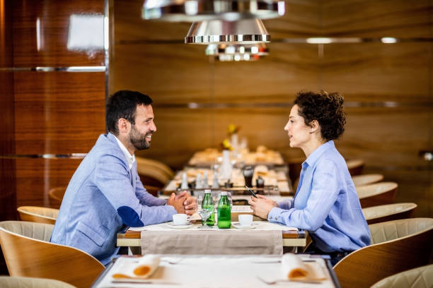 istock Two business people having a meeting in a luxurious restaurant 1167614488