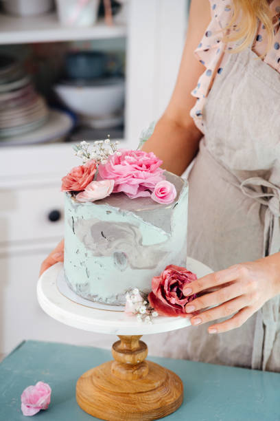 istock Cooking cake with flowers made with love 1167614505