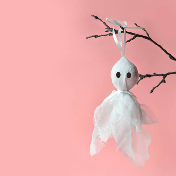 istock Ghost on a pink background, free space for text, Halloween. 1167621942