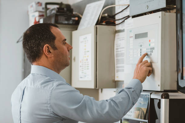 istock Engineer is Controlling the Work of Heating Plant 1167625740