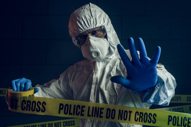 istock Portrait of forensic scientist at crime scene 1167625843