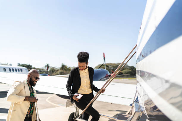 istock Colleagues boarding into flight in a corporate jet 1167627086