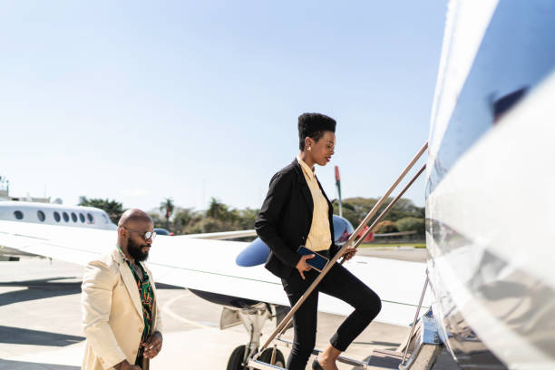 istock Colleagues boarding into flight in a corporate jet 1167627088