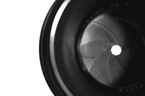 istock Macro closing aperture of camera lens on the white background 1167627131