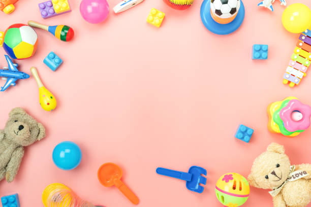 istock Table top view decoration kid toys for develop background concept.Flat lay accessories baby to play with items child on modern pink paper at office desk.Copy space for add text.pastel tone wallpaper. 1167627462