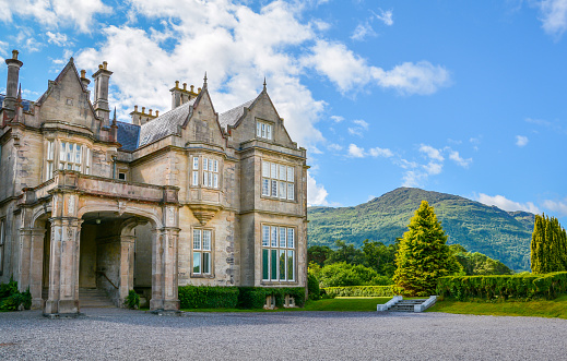 Side view of Muckross House on a sunny morning, County Kerry, Ireland, August-07-2015