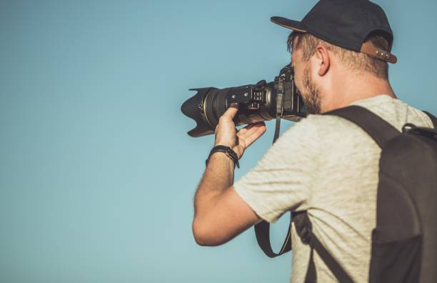 istock Photographer Telephoto Lens 1167633787