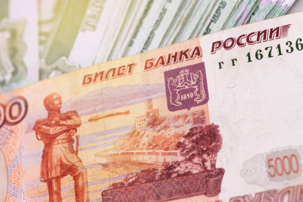istock closeup macro stack of Russian rubles 1000 and 5000 banknotes, Russian money 1167634275