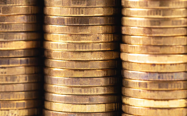 istock closeup macro stacks of metal coins 1167634281