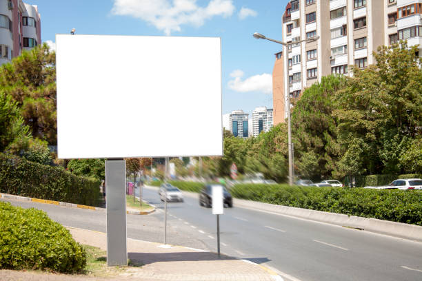 istock advertising board on asphalt road 1167638173