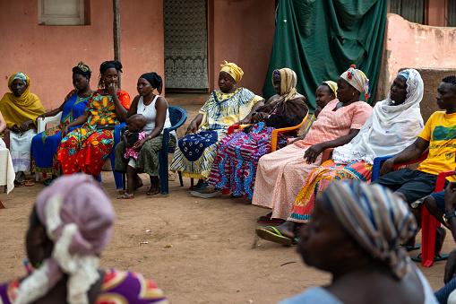 Bissau, Republic of Guinea-Bissau - February 8, 2018: Group of women at a community meeting in the city of Bissau, in Guinea-Bissau, West Africa