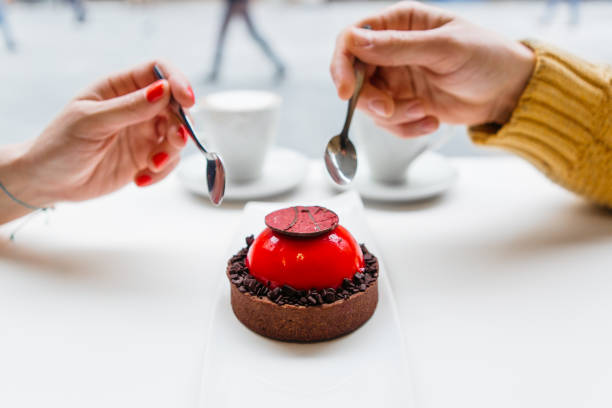 Couple eating cake Close up of couple eating cake 3686 stock pictures, royalty-free photos & images