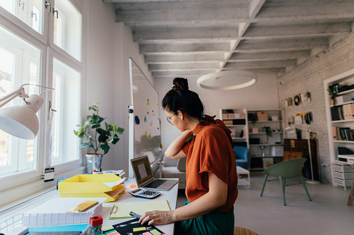 Young woman working in a modern office