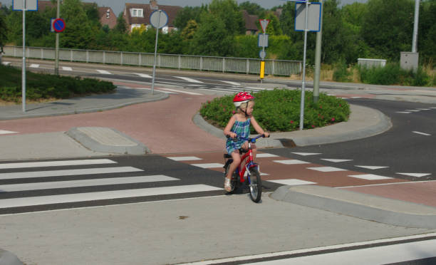 istock Little girl on bicycle 1167644036