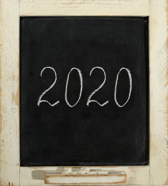 Photo of old slate chalkboard with the inscription 2020